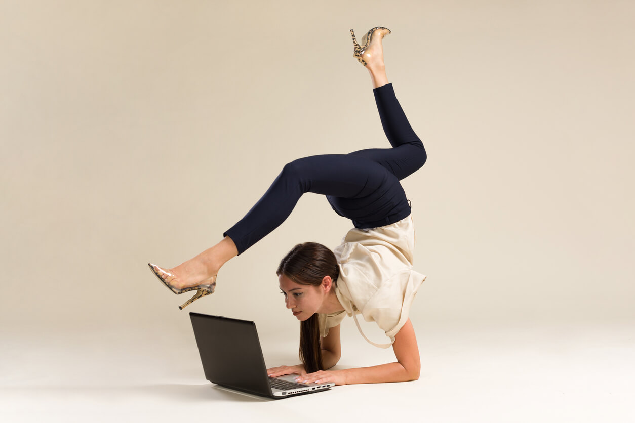 Young Gymnast Flexible WorkingBusiness Woman Stretching And Working On