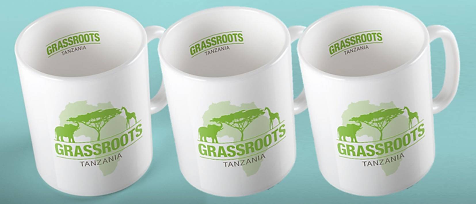 row of white mugs with grassroots logo