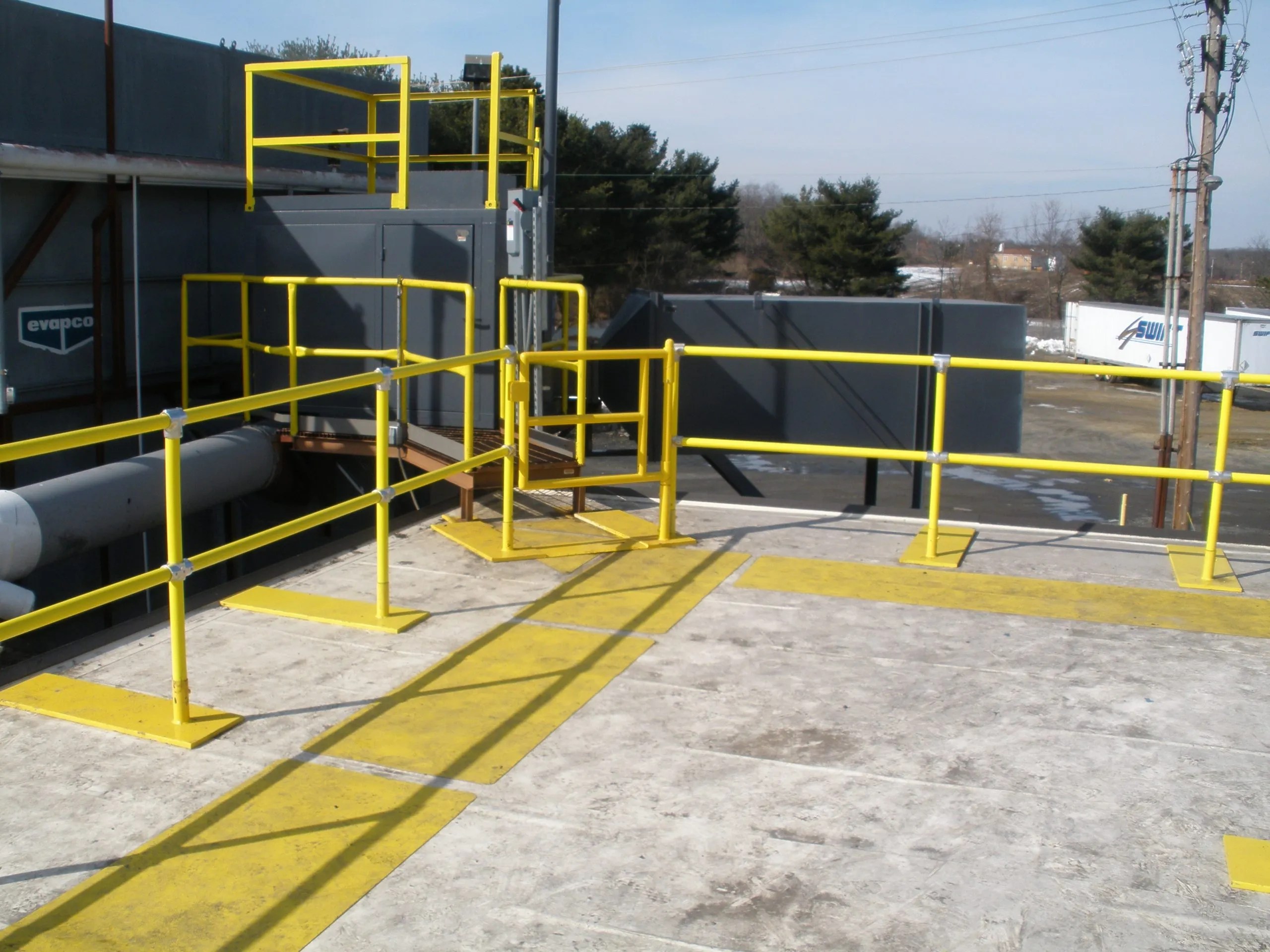 Protect Workers with OSHA Compliant Roof Fall Protection Railing