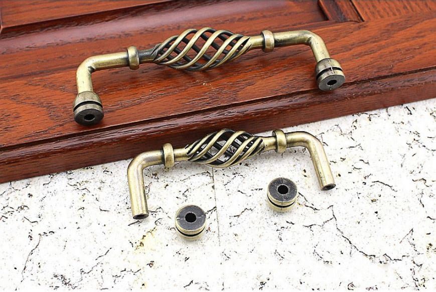 Provincial kitchen handles twist antique brass
