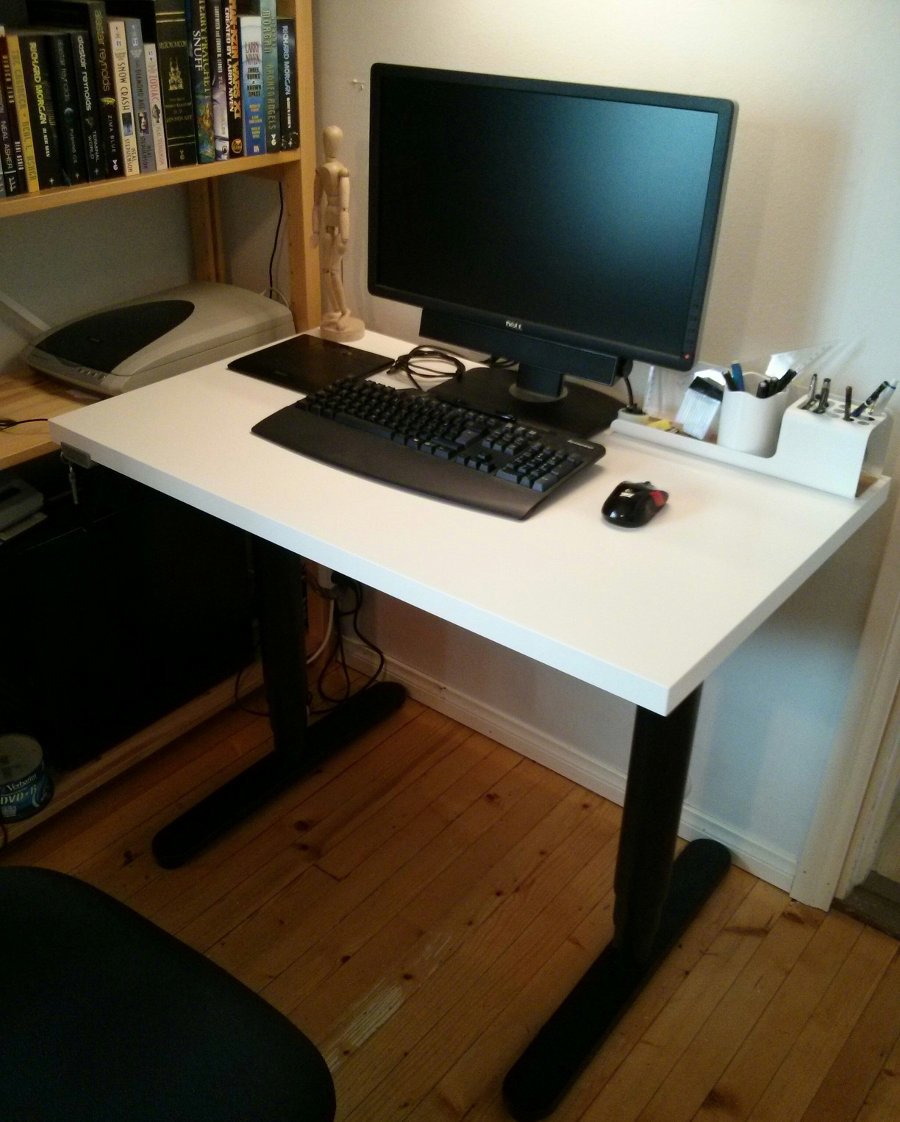 An adjustable width Bekant desk IKEA Hackers