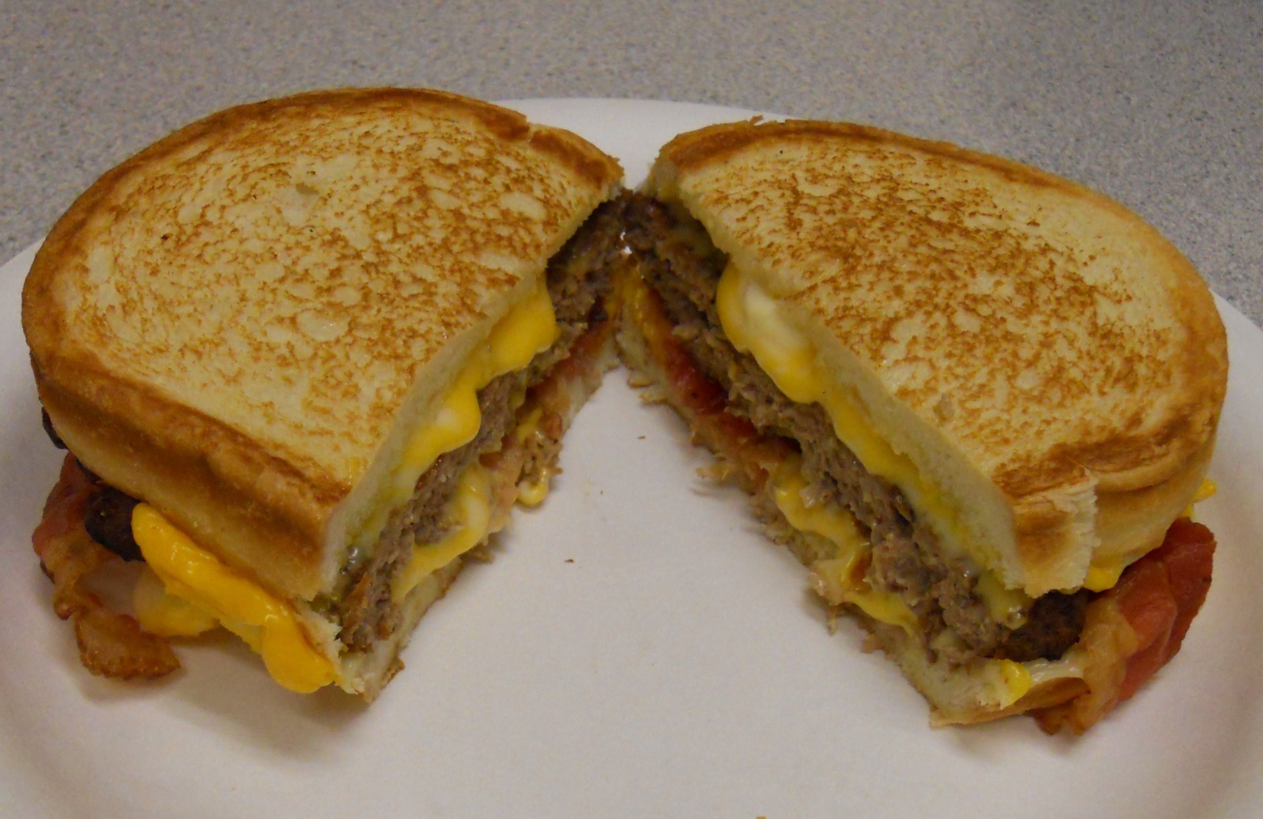 Nibbles of Tidbits, a Food BlogThe New Grilled Cheese Bacon Burger From