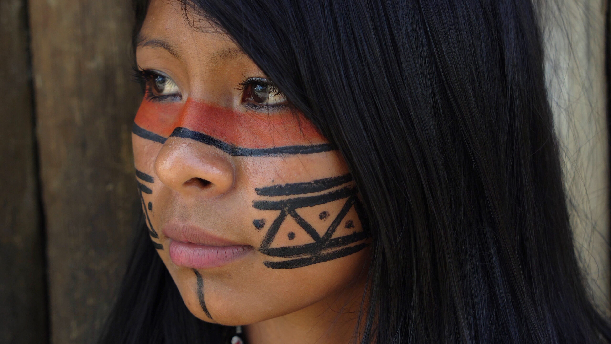 Closeup face of Native Brazilian Woman at an indigenous tribe in the