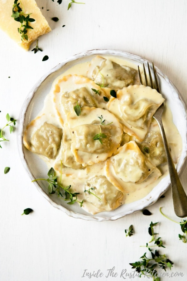 Mushroom Ravioli With Parmesan Cream Sauce Inside The Rustic Kitchen