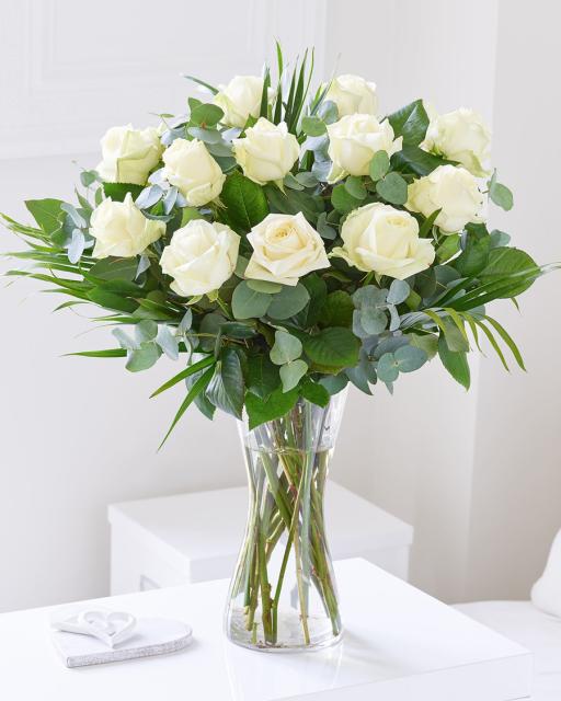 Bouquet of 12 white roses Roses Interflora Lithuania. Flower Delivery