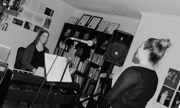 How Much Do Singing Lessons Cost? A Guide by IntoTheBlue