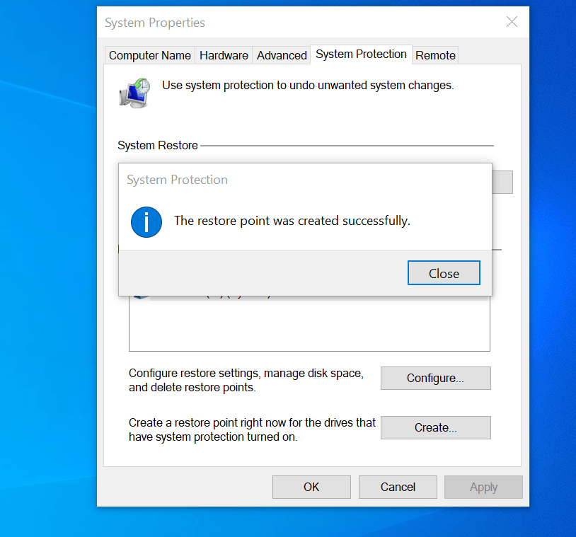 Illustration of a computer using System Restore to revert to a previous state