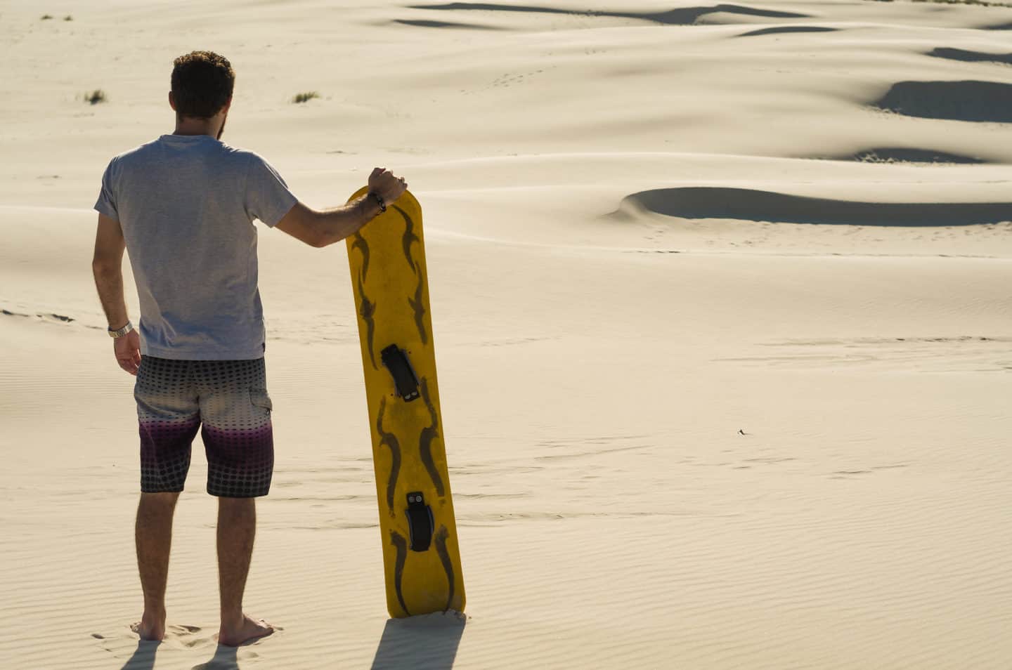 Sandboarding In Dubai Desert Dunes Is A Must For Any Adrenaline Junkies