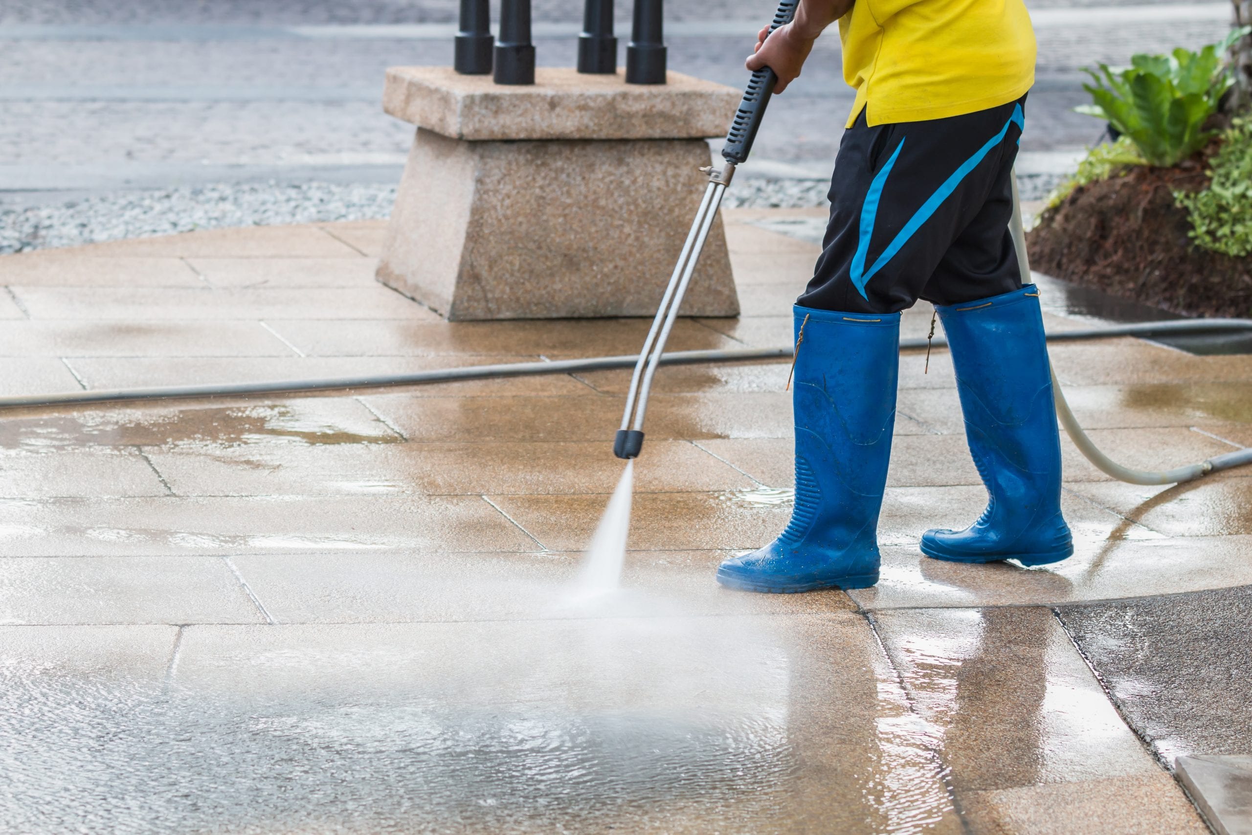Close up Outdoor floor cleaning with high pressure water jet