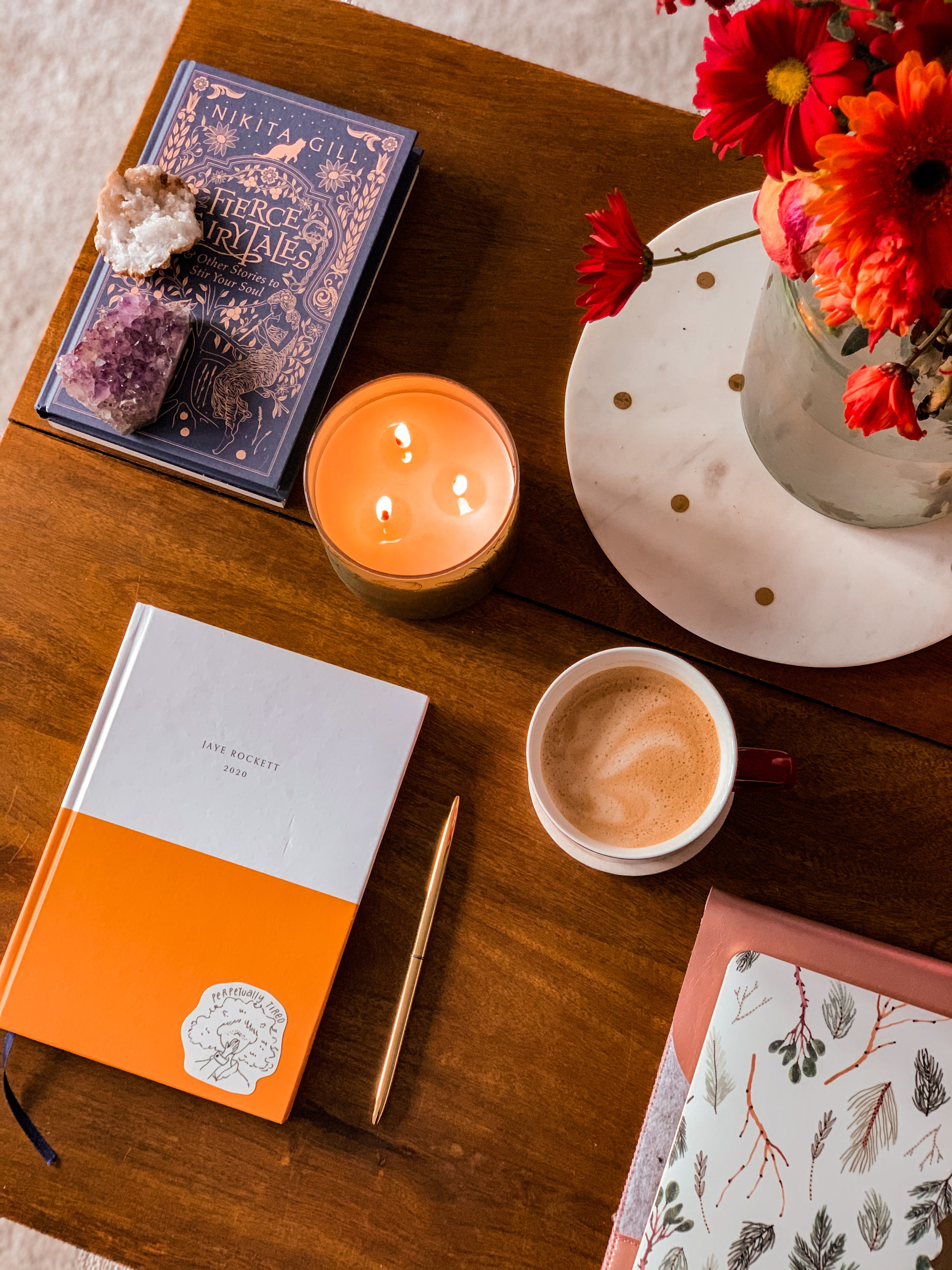 rhythm vs routine jaye rockett coffee desk setup diary laptop candle