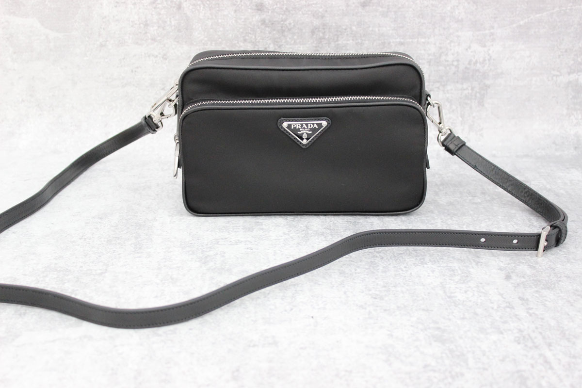 Prada black nylon & leather crossbody camera bag at Jill's Consignment