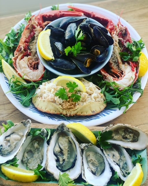 Cornish shellfish platter including lobster, mussels, oysters and crab