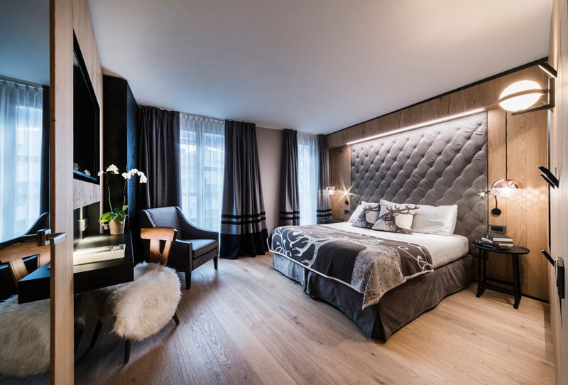 Bedroom Design Idea with Headboards Built into the Walls