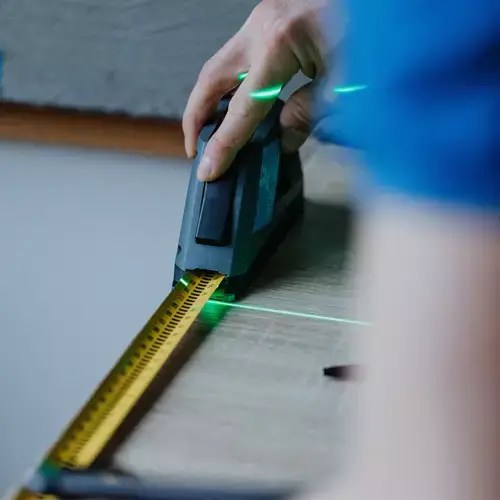 Digital measuring system with distance meter in a case