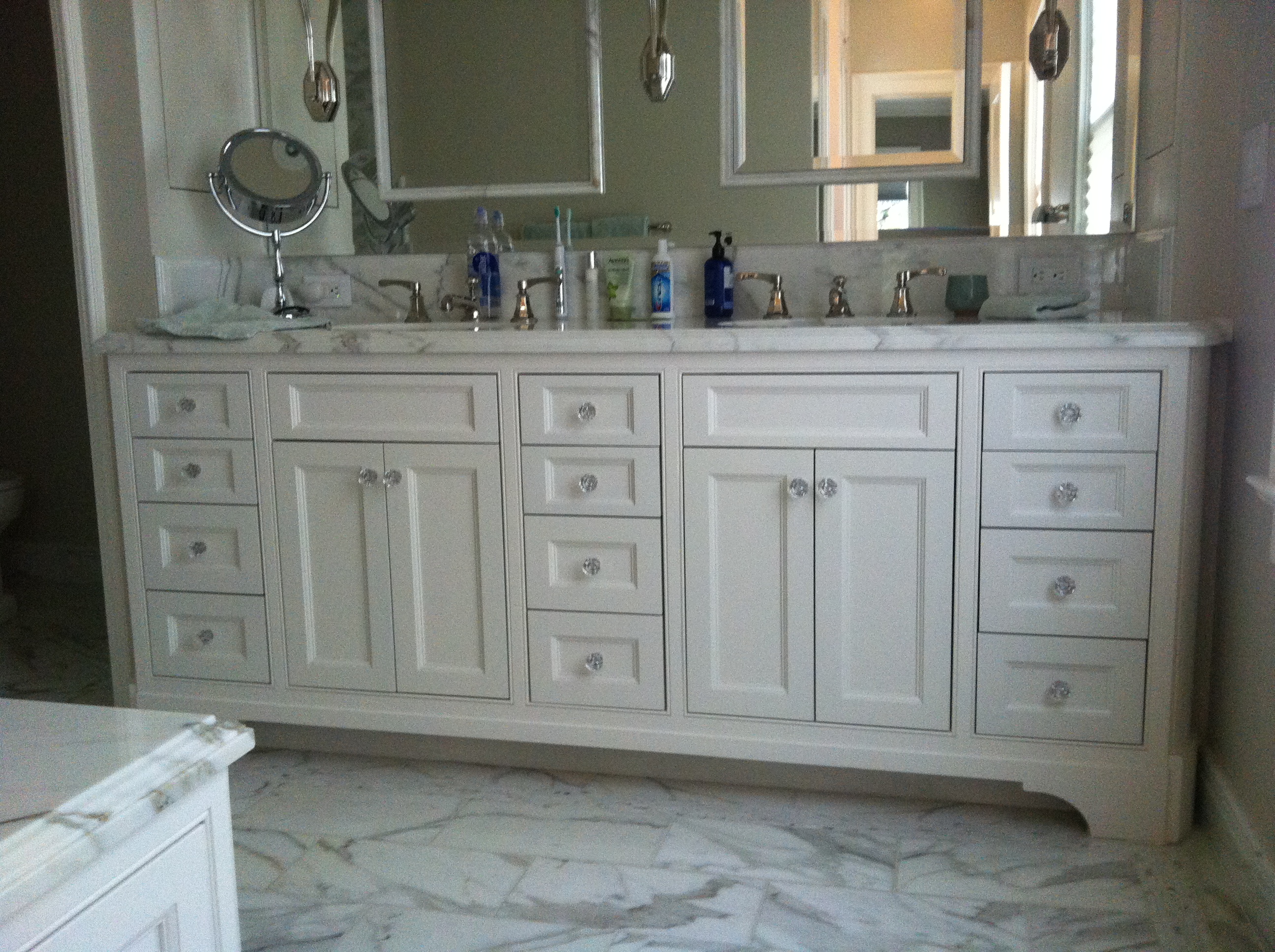 Keith Bruns Woodworking » White Curved Vanity with Decorative Feet