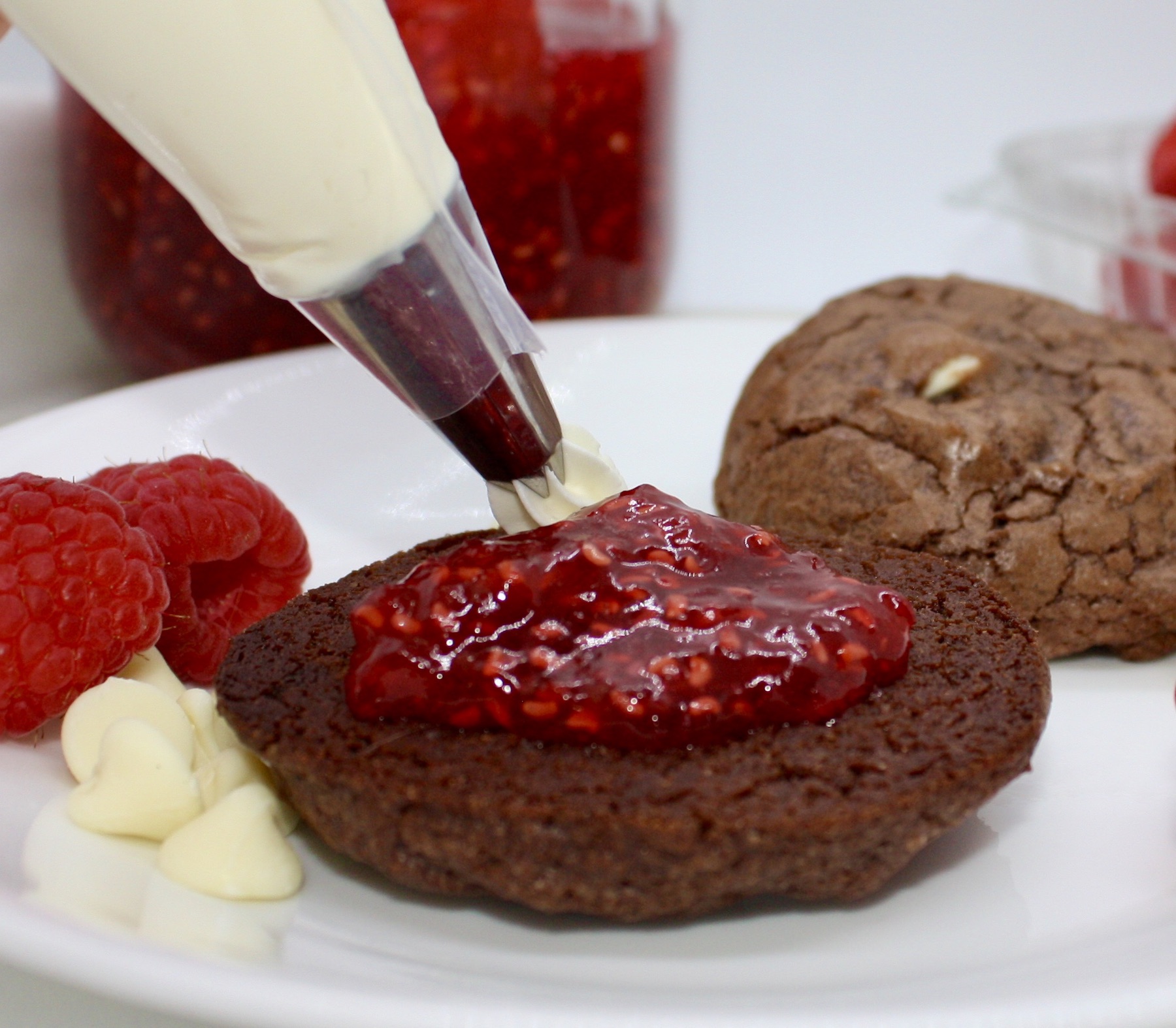 Brownie Cookie Sandwich being frosted