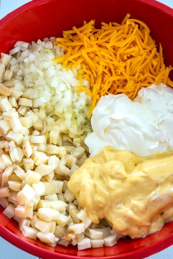 Sour Cream Scalloped Potatoes Recipe: How To Make It Cheesy Hashbrown Potato Casserole - Kitchen Gidget