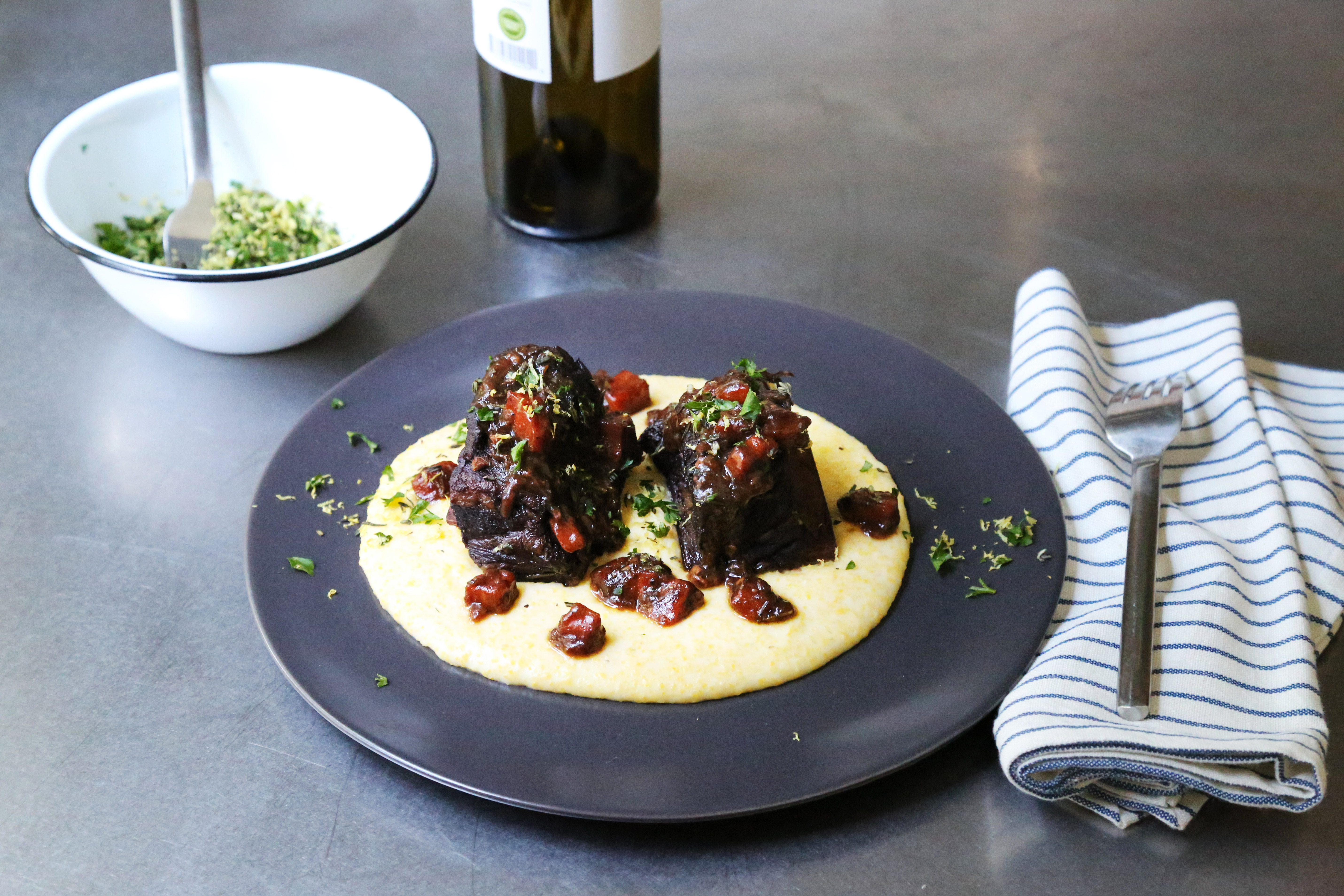 Zinfandel Short Ribs with Goat Cheese Polenta and Mixed Herb Gremolata