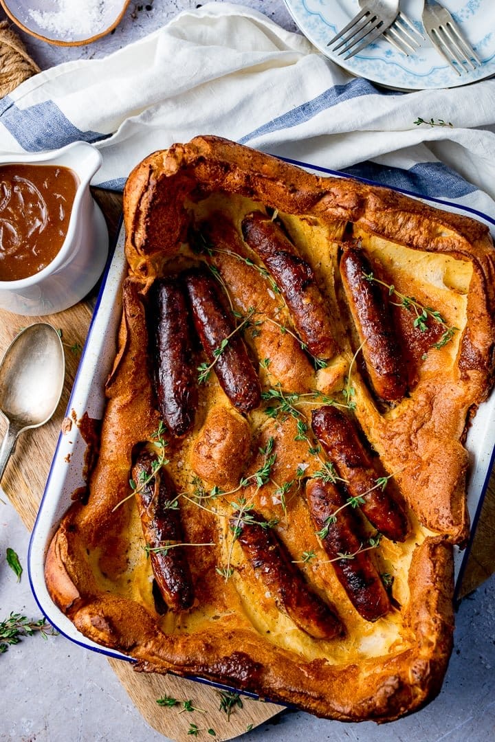 Toad in the hole or sausage toad is a traditional english dish consisting of sausages in yorkshire pudding batter, usually served with onion gravy and vegetables. Traditional Toad In The Hole Recipe