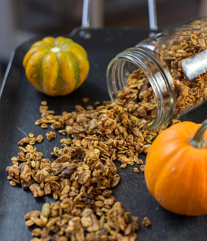 This Pumpkin Granola recipe uses pumpkin seeds, nuts, oats and spices to create a fast, healthy and delicious combination of flavors.