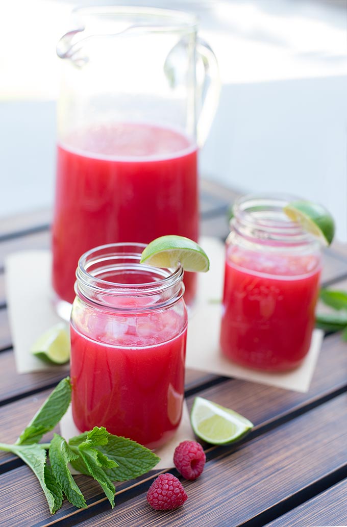 Hot summer days got you dragging? This flavor-packed homemade Raspberry-Mint Limeade will quench your thirst and pick you up on a 100-degree day!