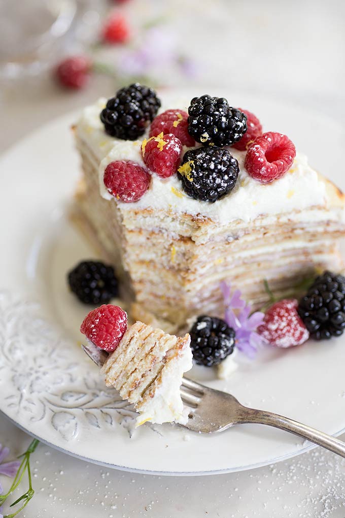 Step-by-step Breakfast Crepe Cake - a simple breakdown of how to make a perfect breakfast crepe cake! Raspberry and lemon ricotta between layers of crepes!