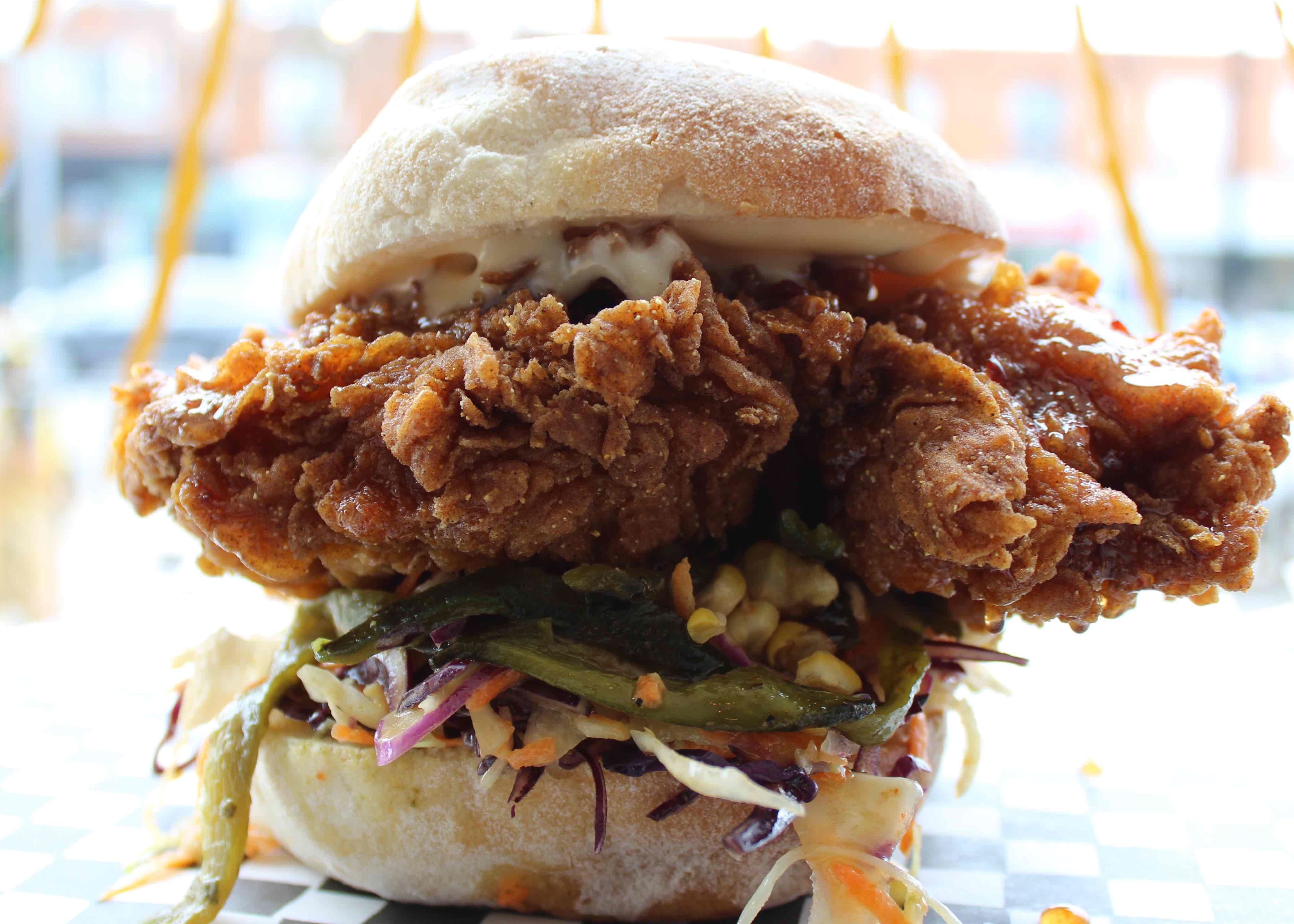 Knuckle Sandwich Toronto Sandwich, Poutine, Fries, Salad, Craft Beer