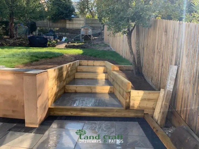 Patio with Rendered Wall and Retaining Staircase in Brighton