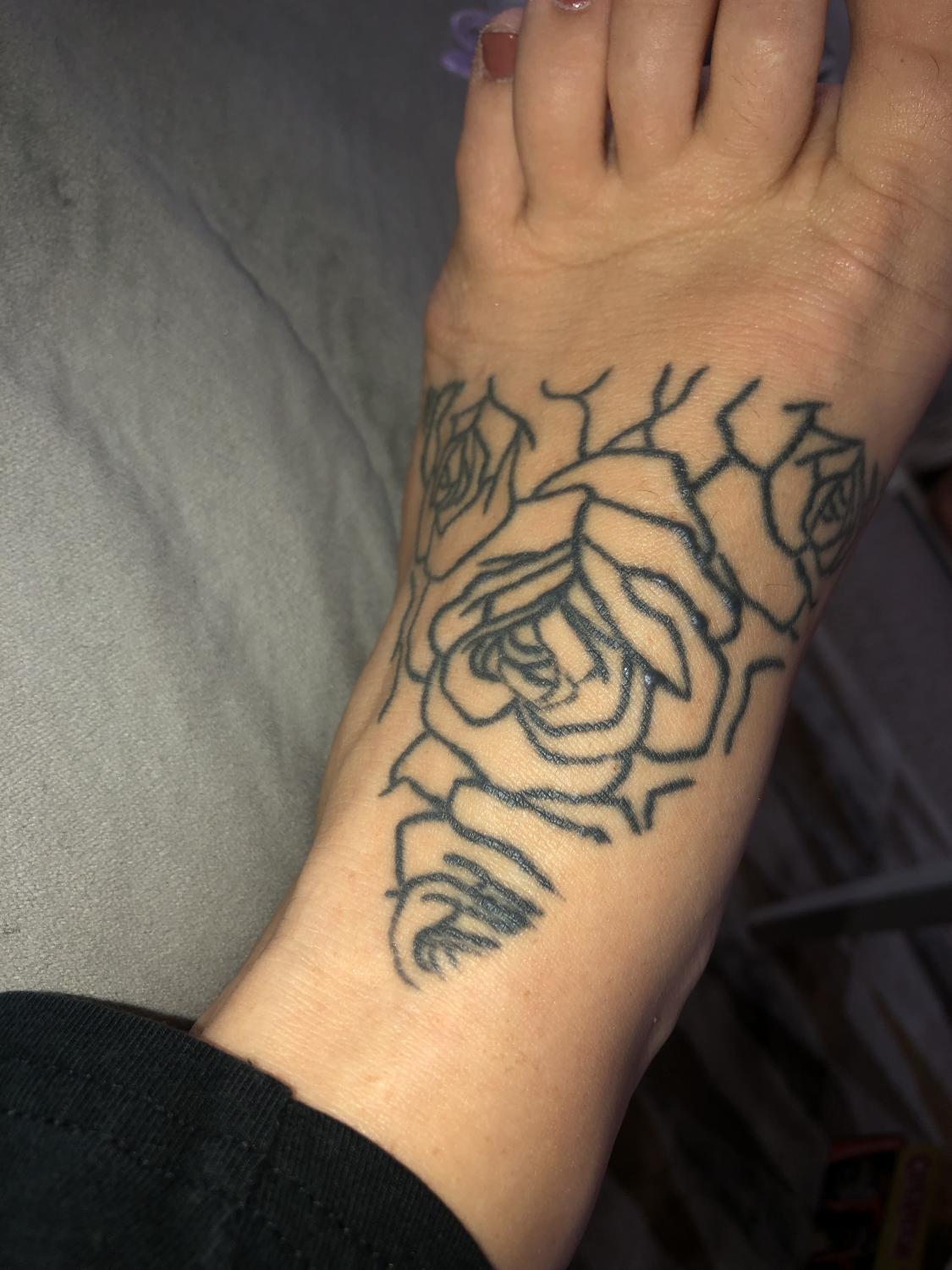 Bumps on black ink Initiation Last Sparrow Tattoo