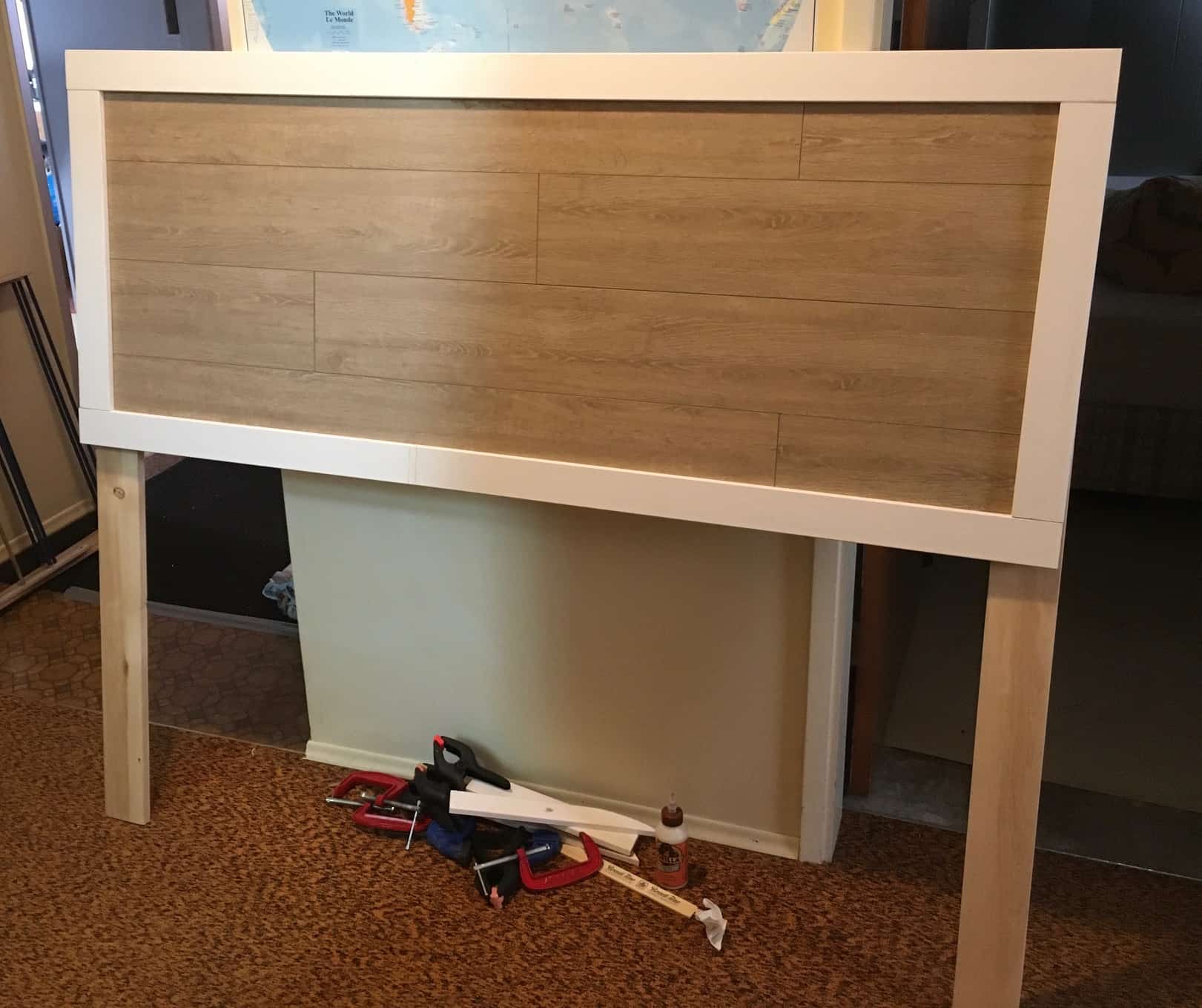 How to build a Stylish yet Cheap DIY Headboard using Laminate Flooring