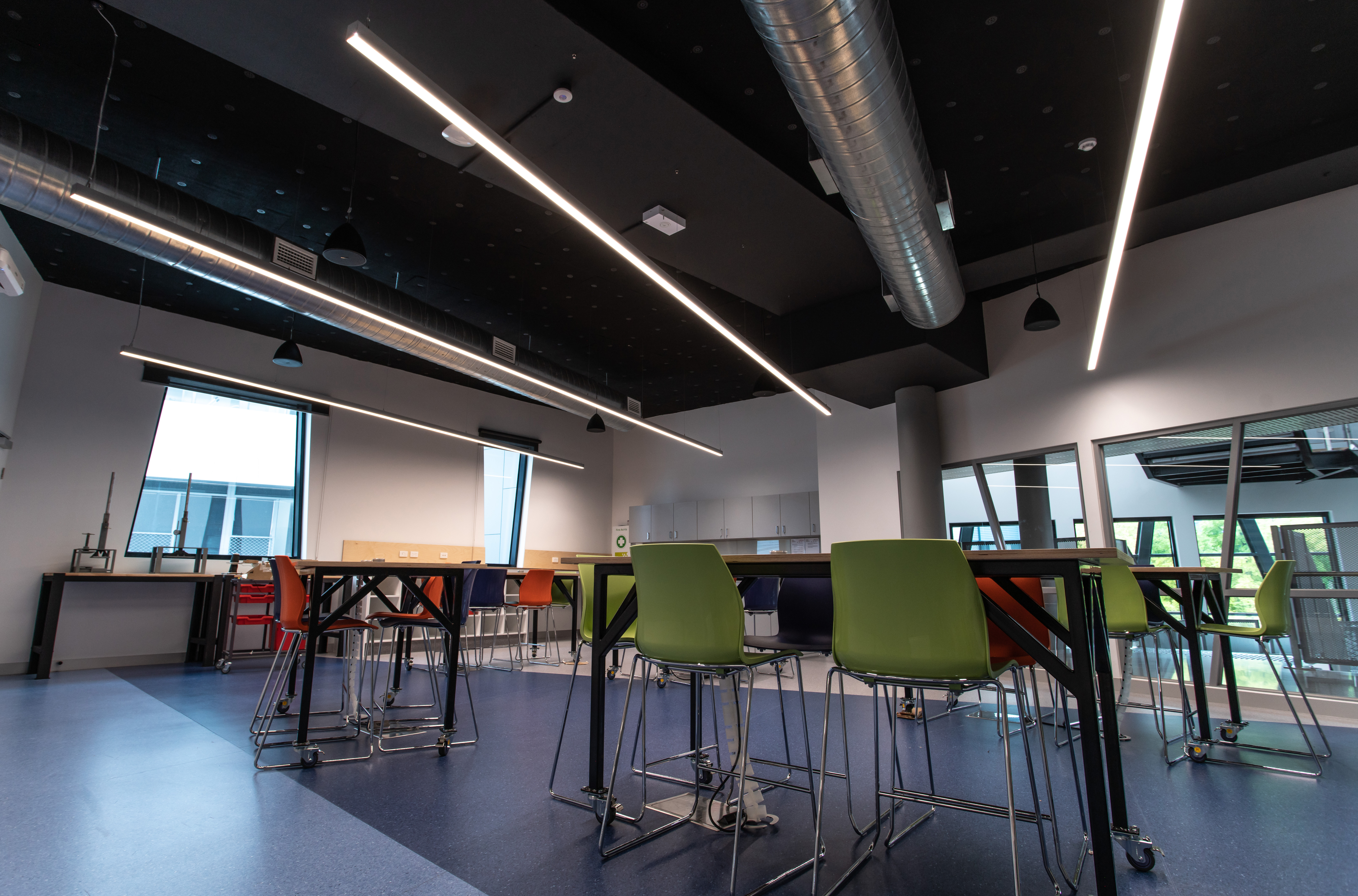 Colourful lighting fixtures for an inspirational and playful atmosphere at students facilities
