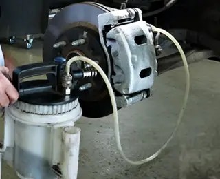 What is Brake Bleeding vs. Fluid Exchanging | Les Schwab