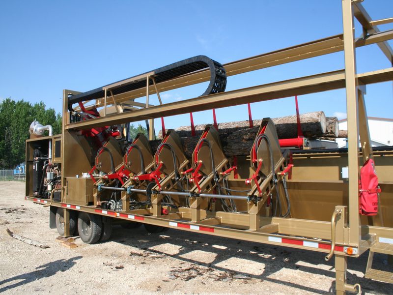 ALL USED SAWMILL MACHINERY and Equipment Ligna Machinery, Inc.