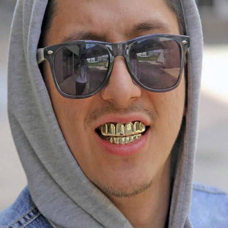Why Do Rappers Wear Gold Teeth Live Enhanced