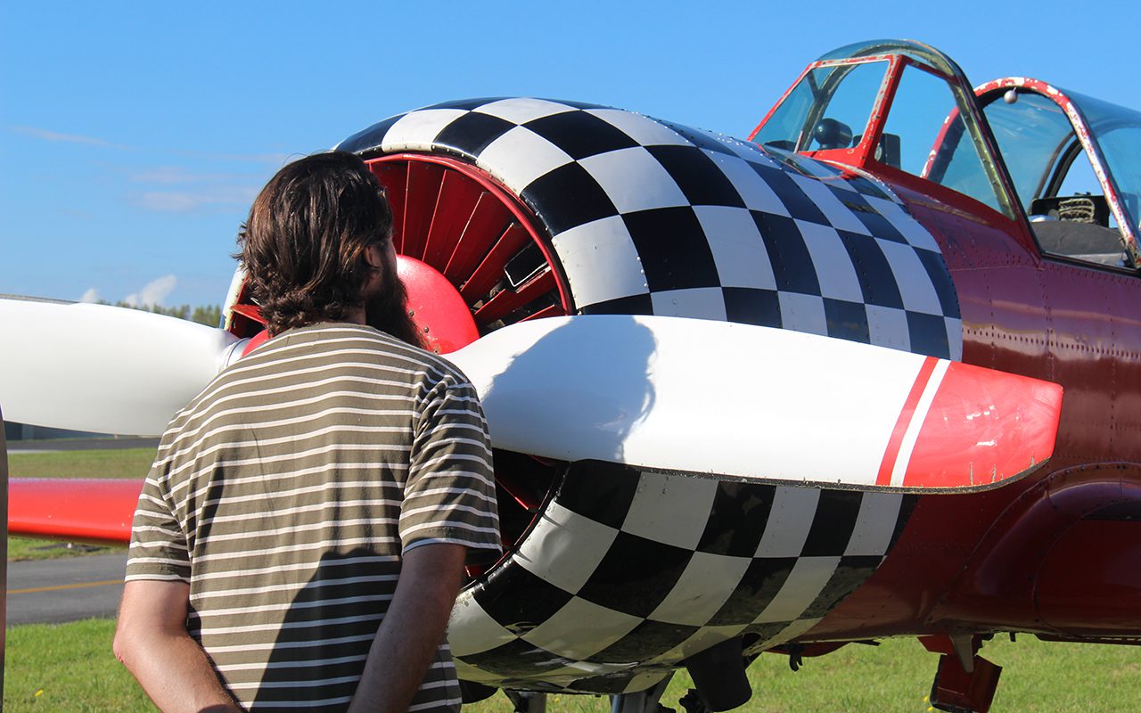 Close up look at classic aircraft in Dairy Flat Local Matters