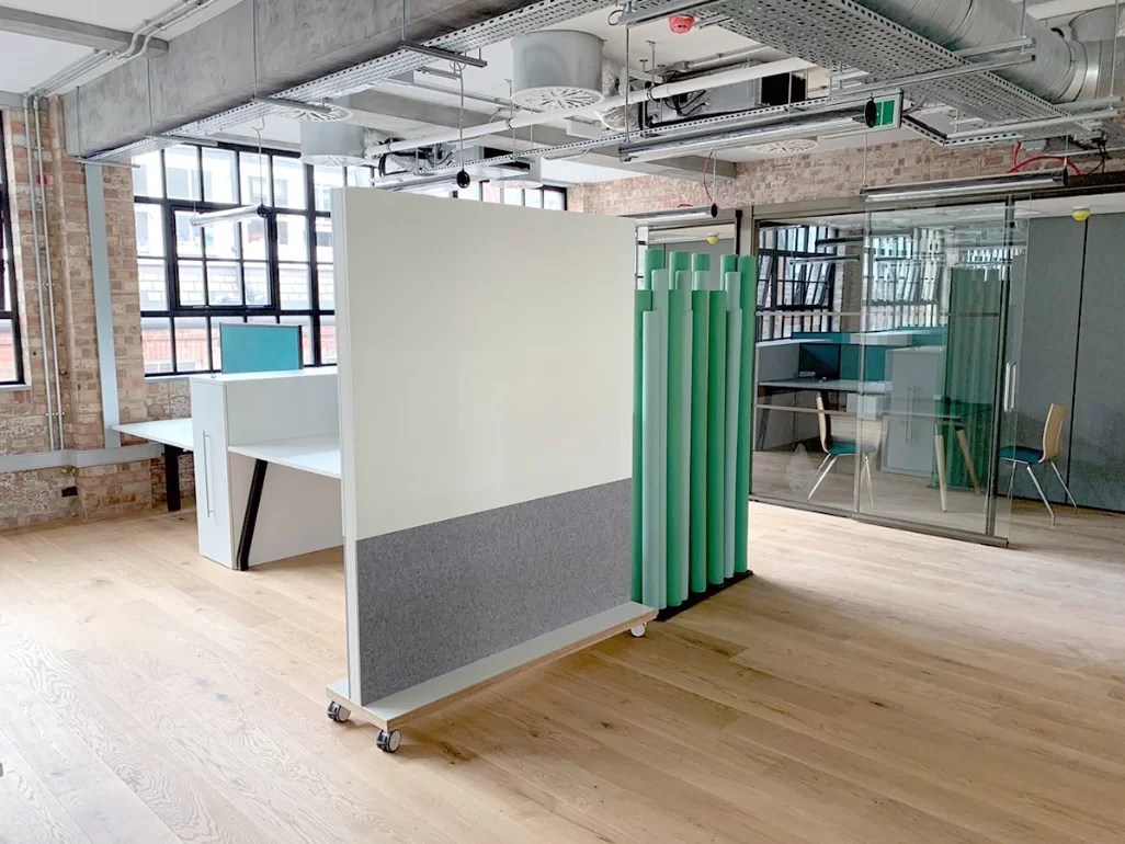 Dividing up work spaces with whiteboard office screens Logovisual Ltd