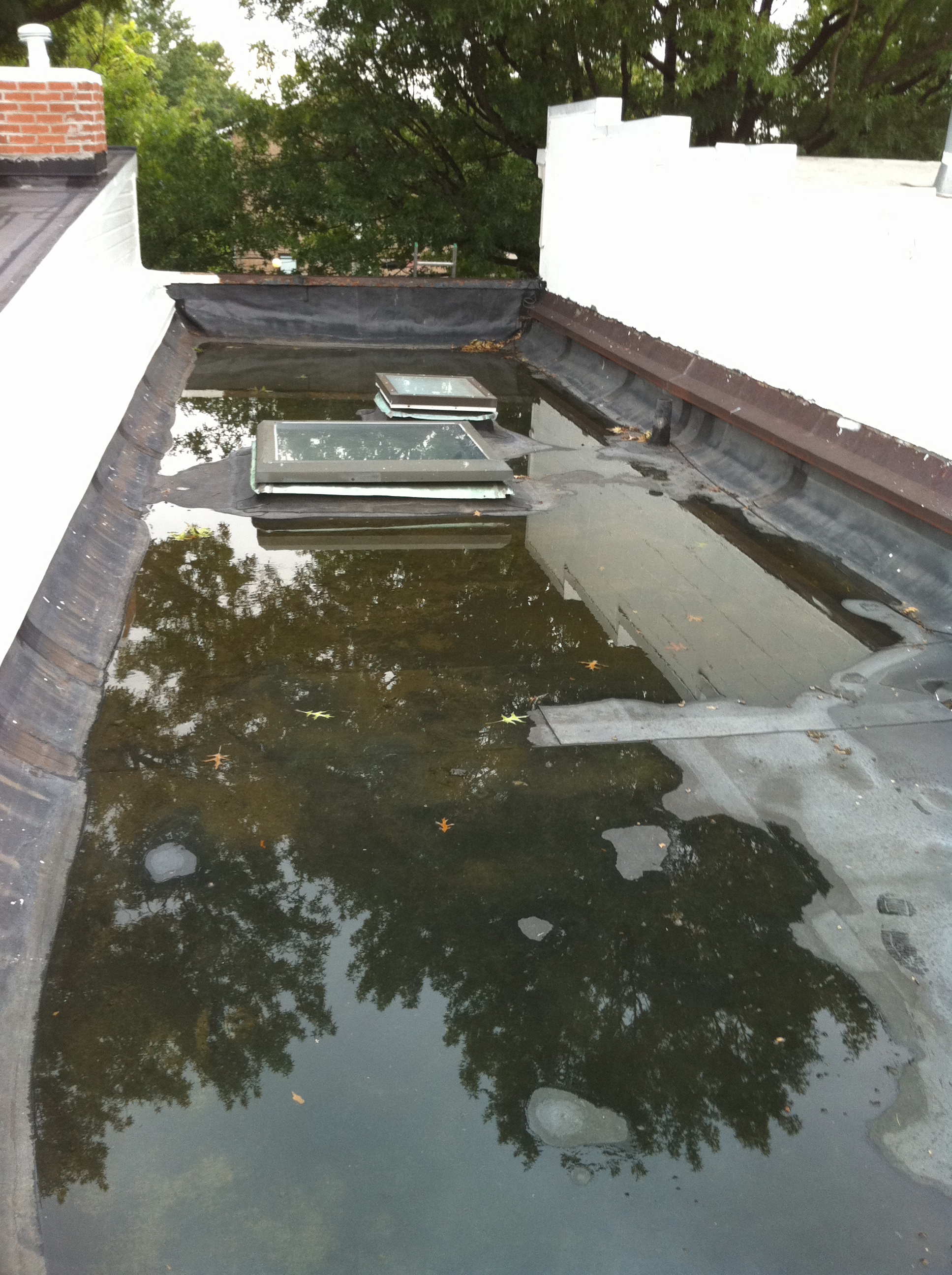 New Flat Roof with Tapered Insulation Lyons Contracting