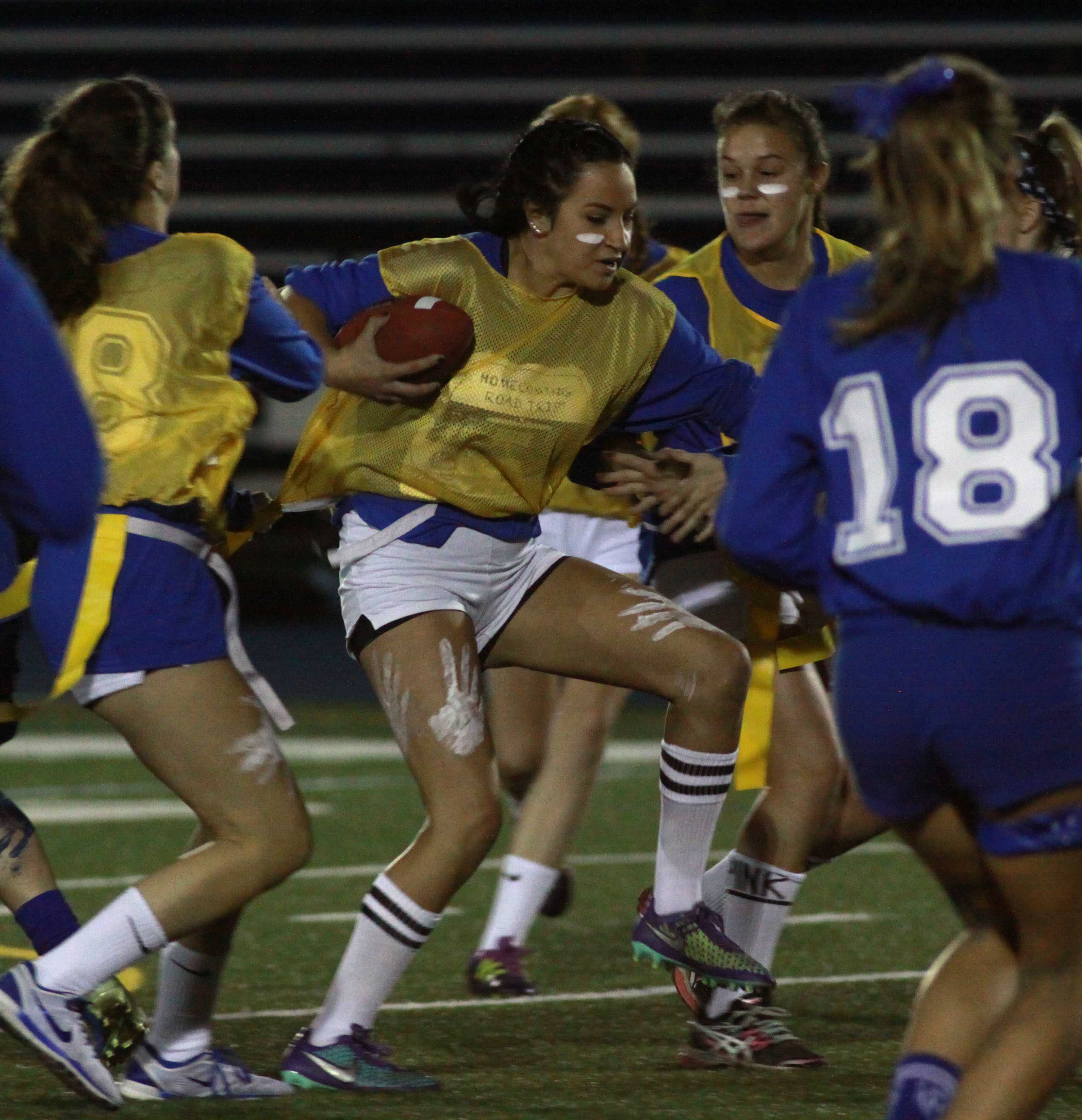 Junior girls tackle first powderpuff game, blue team prevails Bear Facts