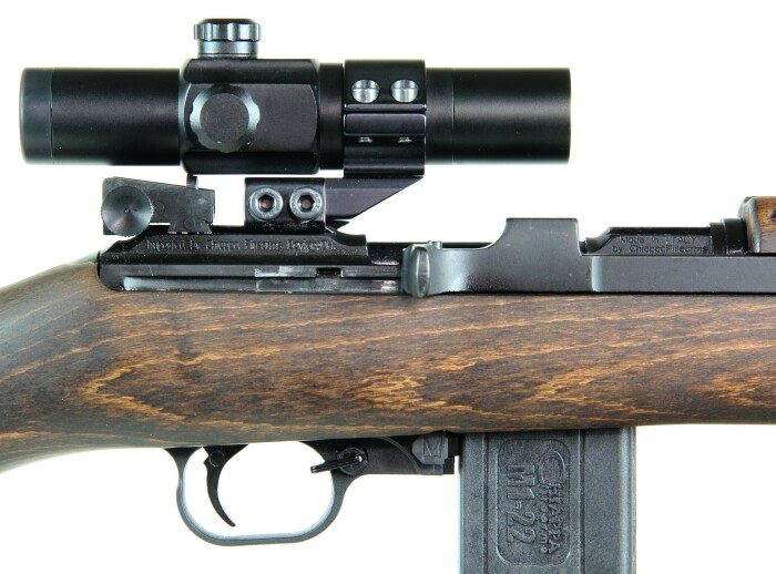 Red dot scope mounted using a cantilever mount. The scope clears the