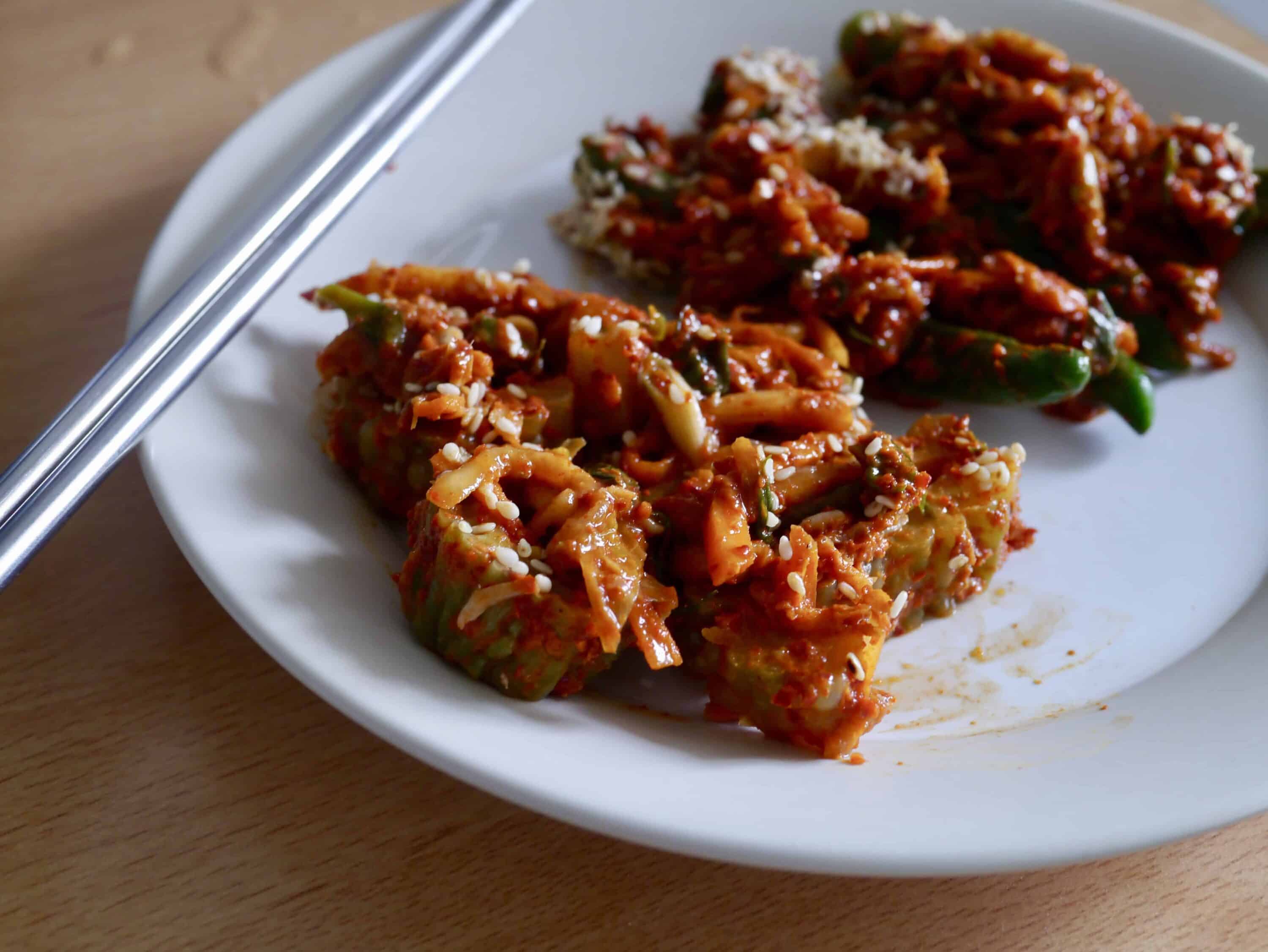 Korean food photo Green chili pepper and bitter melon kimchi on