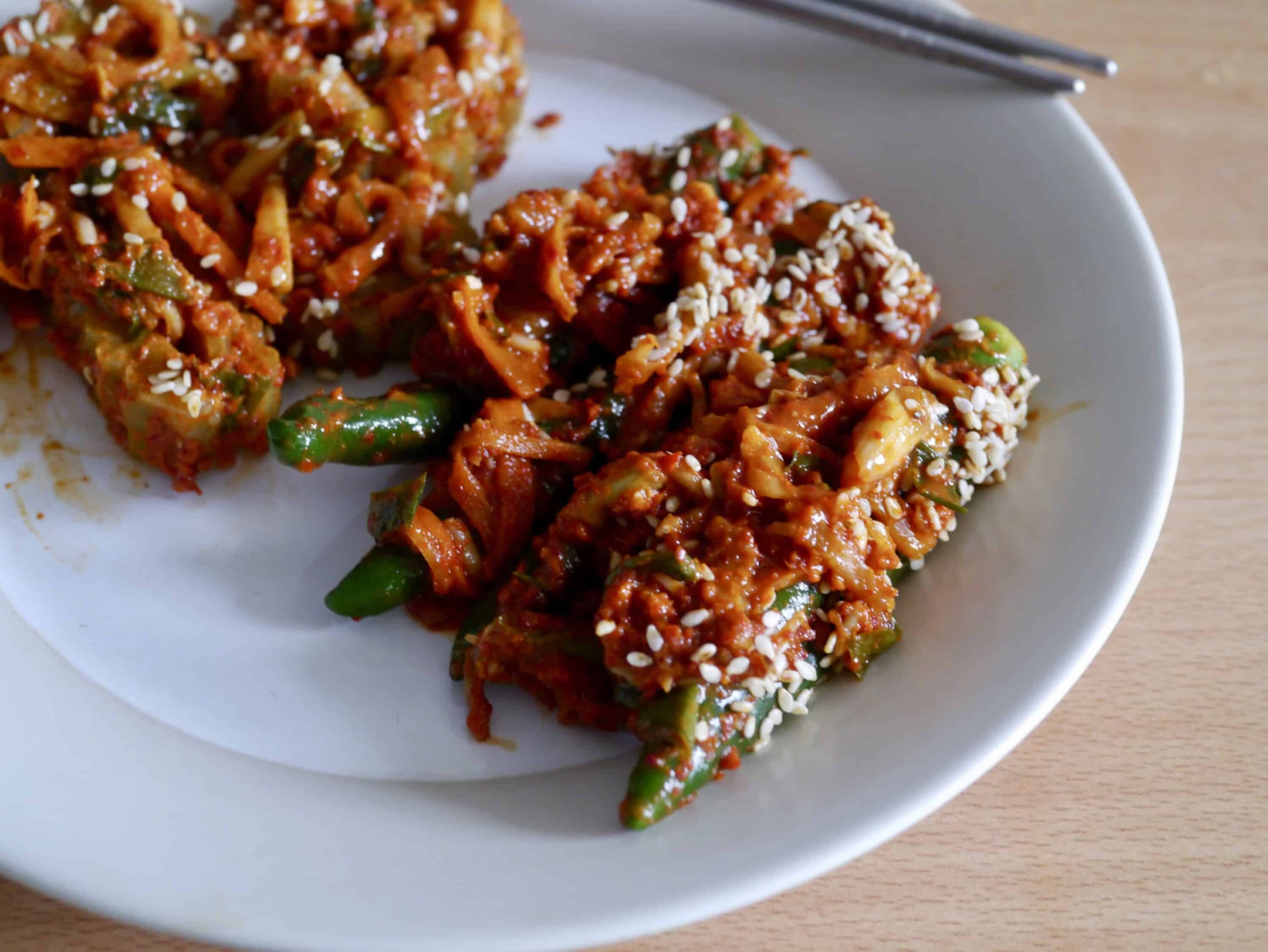 Korean food photo Green chili pepper and bitter melon kimchi on