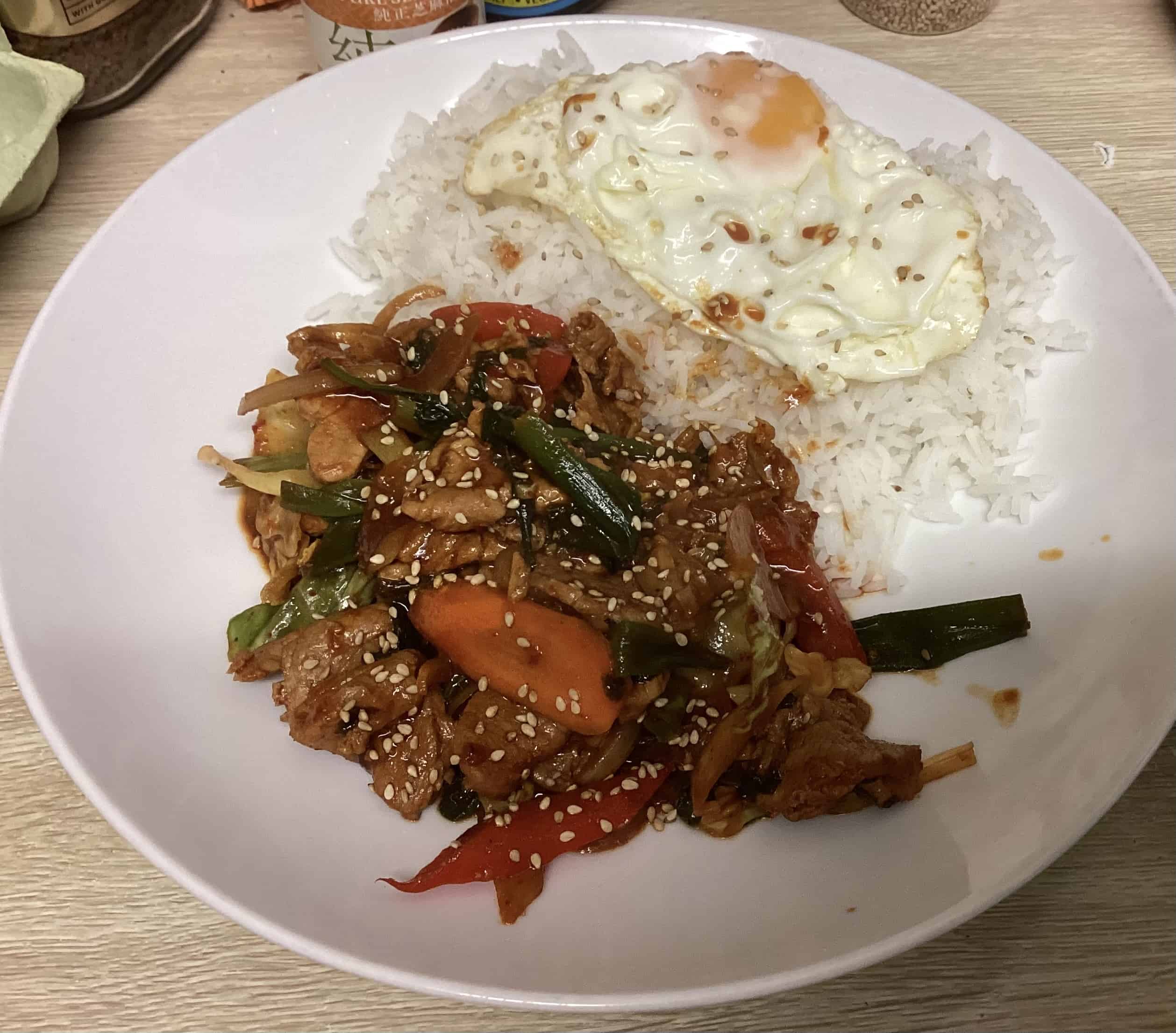 Spicy pork and vegetables over rice (Jeyukdeopbap 제육덮밥) recipe by