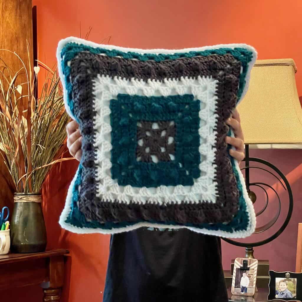 A crochet football pillow to show your team spirit MadameStitch