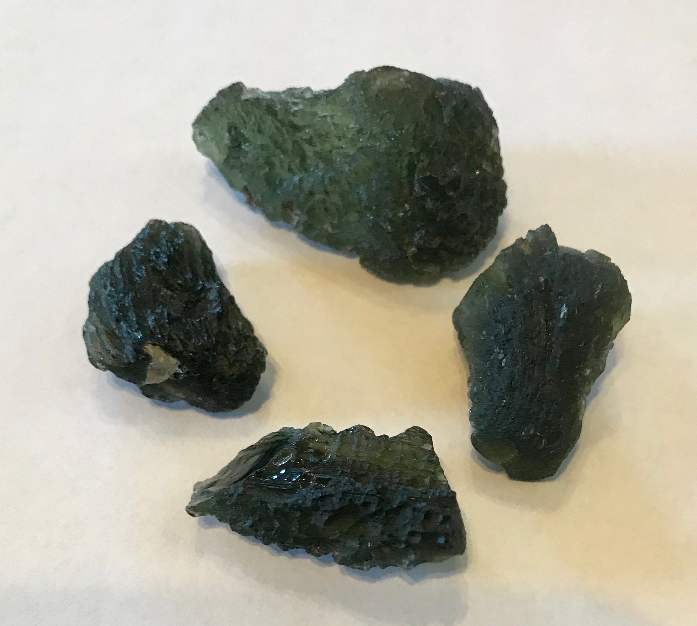 Real Moldavite Versus Fake Moldavite How to tell the difference.