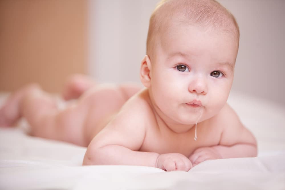 Why Does My Baby Spit Up after Laying Down? (Causes and Treatments