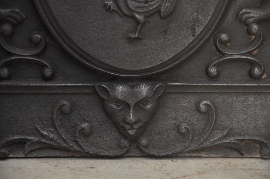 Cast iron fireback with roosters and lions decoration Firebacks