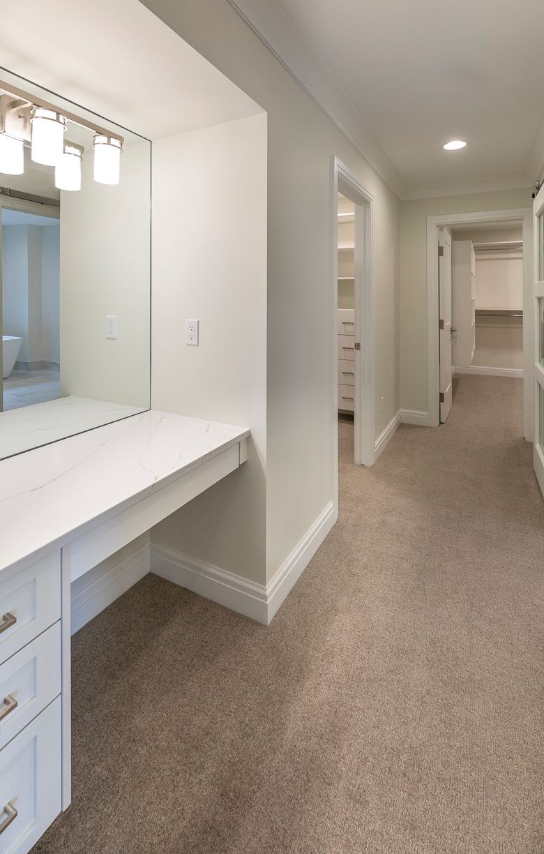 Make Up Vanity and hall with closets Mark Adler Custom Homes