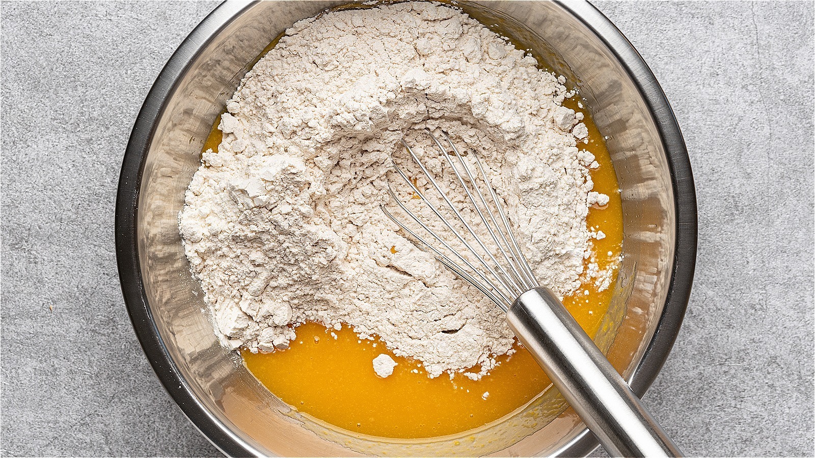 You Can Prevent A Baking Flour Mess With An Easy Whisk Hack