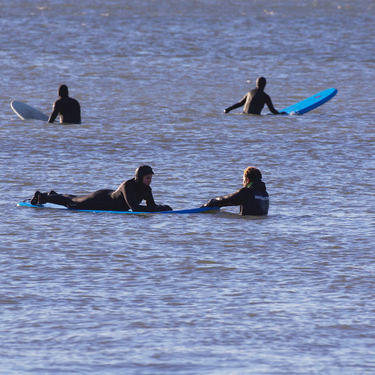 This Cool NYC Hotel Is Offering Winter Surf Lessons on Rockaway Beach
