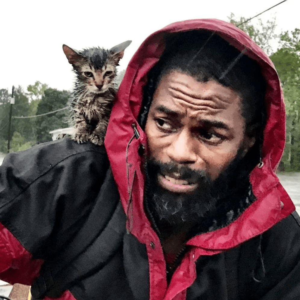 This Photo of a Man Rescuing His Kitten During Hurricane Florence Prov